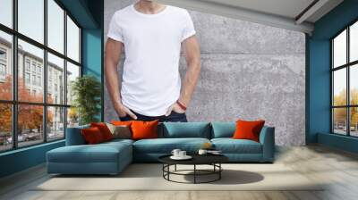 man wearing white t-shirt Wall mural