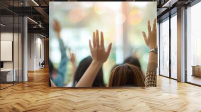 A group of people are in a classroom, one of them raising their hand Wall mural