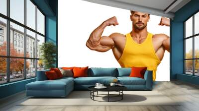 A man with a muscular build is posing for a photo in a yellow tank top Wall mural