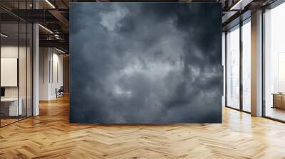 Dark black clouds in the sky, Stormy rain clouds background. Wall mural