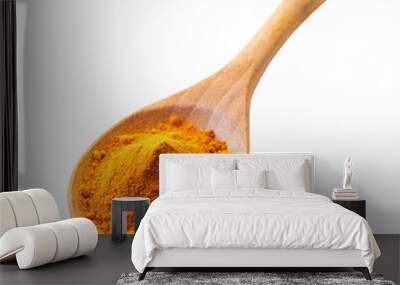 Turmeric powder in wooden spoon isolated on transparent background. Spices and herbs. Wall mural