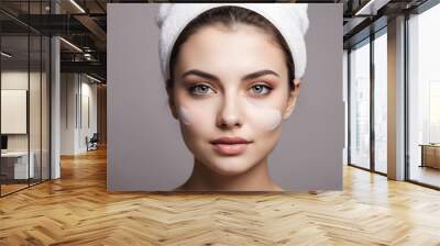 Beautiful young woman with clean fresh skin. Girl beauty face care. Facial treatment. Wall mural