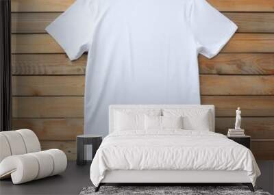 Blank White T-Shirt Mockup on Wooden Background Wall mural