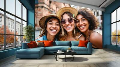 Three young diverse women having fun on city street outdoors - Multicultural female friends enjoying a holiday day out together - Happy lifestyle, youth and young females, Generative AI Wall mural