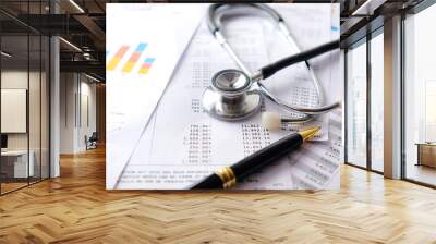 Stethoscope with Pen, Charts and Graphs, Finance, Account, Statistics, Investment, Analytic Research Data Economy Spreadsheet and Business Company Concept Wall mural