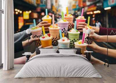 Friends Sharing Colorful Bubble Tea Outdoors
 Wall mural