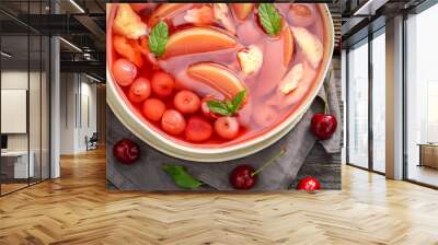 Delicious fruit soup with apples and cherries Wall mural