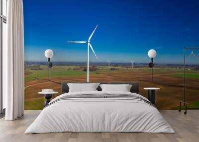 Flying above ecological wind turbines as pure energy Wall mural