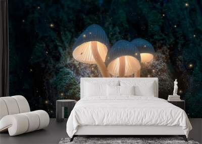 Glowing magic mushrooms on tree in dark forest with fireflies Wall mural