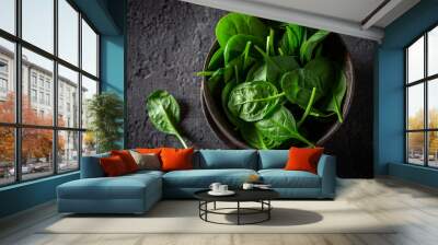 Healthy green spinach in small rustic brown bowl Wall mural