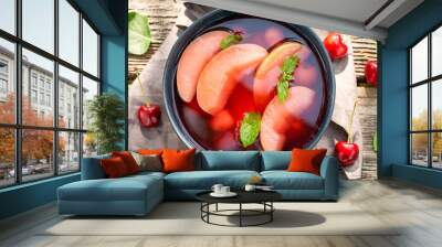 Tasty and fresh fruit soup made of summer fruits. Wall mural