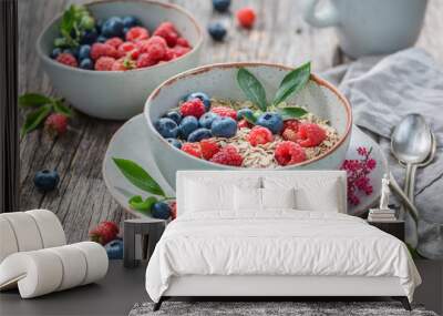 Tasty oat flakes for breakfast in summer garden Wall mural