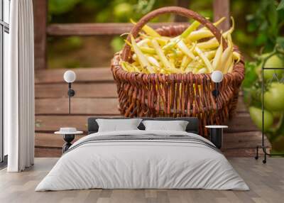 Tasty yellow beans in an old wire basket Wall mural