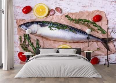 ingredients for baking scomber fillets, include raw mackerel, lemon, garlic, rosemary Wall mural