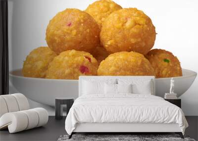 plate of laddu, laddoo or ladoo isolated white background, popular traditional Indian sweet treats made during festivals, religious ceremonies and celebrations Wall mural