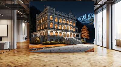 luxury hotel resort at the base of a mountain in the yellow orange autumn woods at night. modern baroque architecture building in the woodland wild forest mountains. Wall mural