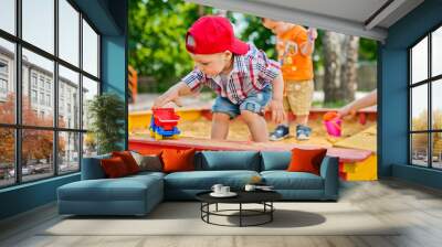 child plays with sand Wall mural