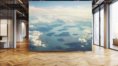 Aerial view of a land with blue sky clouds. Wall mural