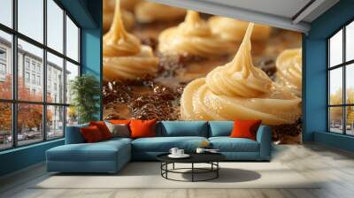   A close-up image of a plate with peanut butter frosting and icing on desserts Wall mural