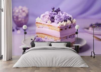  a piece of cake with purple frosting and purple flowers on a white plate on a purple tablecloth with a vase of purple flowers in the backgro. Wall mural