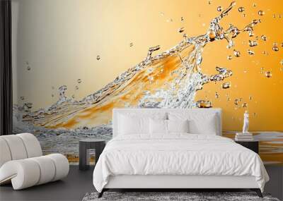   An orange background with water splashing from above and below a central orange object Wall mural