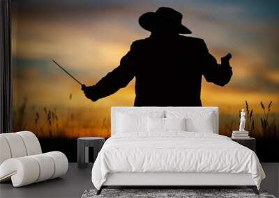 Silhouette of a demon and vampire hunter with a dramatic sky in the background. A man with a katana and a revolver. Fantasy and halloween concept Wall mural