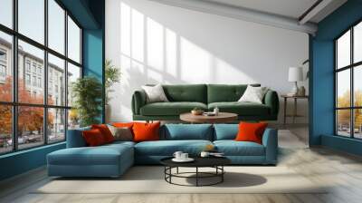 Green velvet sofa with white and gray patterned pillows, wooden coffee table, and natural light from windows. Wall mural