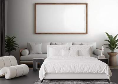 Minimalist living room with a large white sofa, wooden coffee table, and a blank framed wall art Wall mural