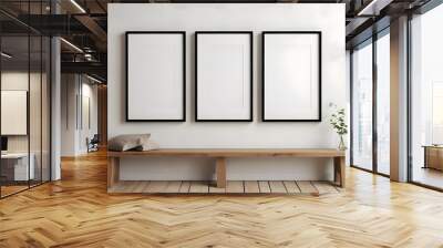 Three blank picture frames on a wall above a wooden bench Wall mural