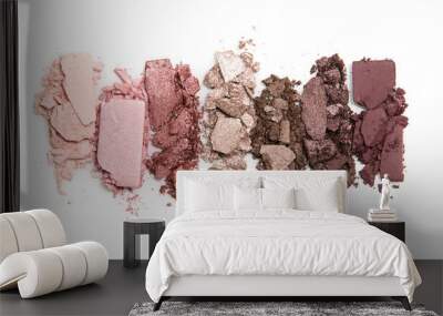 A smashed, neutral toned eyeshadow make up palette isolated on a white background Wall mural