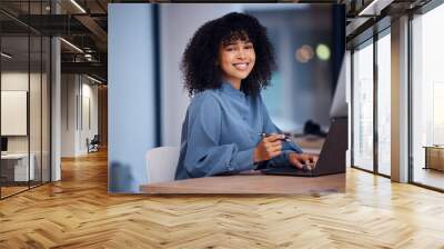 Happy, working and portrait of a black woman on a laptop for email, connection and internet. Business, smile and employee typing on a computer for online work, project and freelancing in office Wall mural