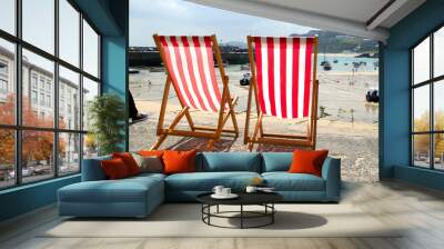 two empty deckchairs on the sea front, st. ives, u Wall mural