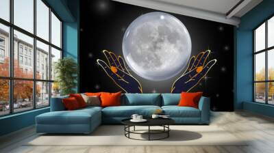 Hands holding the full moon on a starry background with moon phases Wall mural