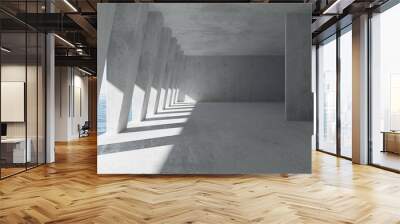 Abstract large, empty, modern concrete room with row of sloped pillars, divider wall, rough floor and view to the outside with ocean and sky background on the left Wall mural