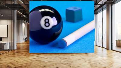 Billiard pool game eight ball with chalk and cue on billiard table Wall mural