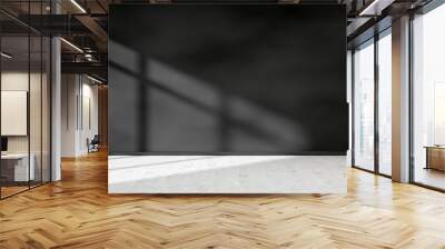 Empty room with blank black wall with window shadow and white hardwood floor - presentation or gallery architecture background element Wall mural