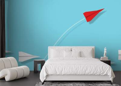 Red paper plane emerge from group of white paper planes on blue, business concept for leadership, new ideas, innovation or creativity Wall mural