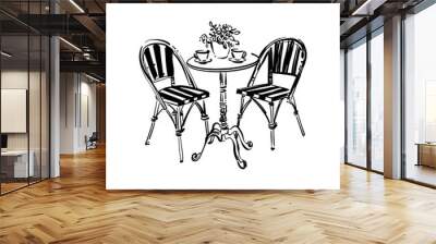 Hand-drawn sketch. Two chairs and tea cups on the table. Vacation postcard. Black and white street cafe furniture. Bistro round table with two chairs hand drawn marker Wall mural