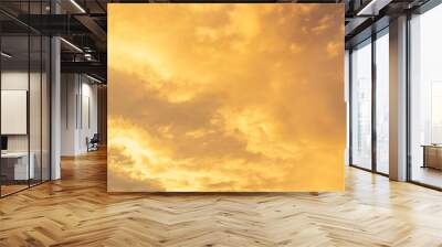 cumulus, cirrus, clouds on pale pink and gold sky with glow, shine, light up, natural background Wall mural