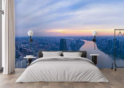 Aerial view of modern city skyline and buildings at sunrise in Shanghai Wall mural