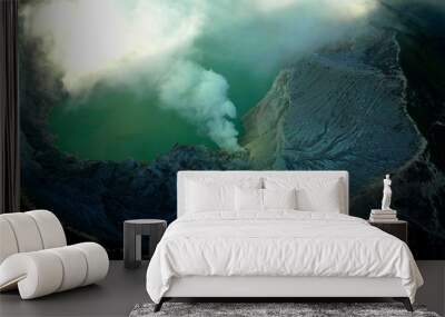 A top view inside a volcano which is erupting in the Java island in Indonesia Wall mural