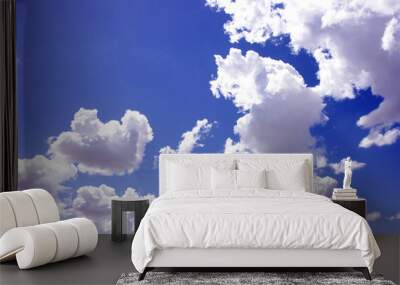 blue sky with puffy white clouds Wall mural