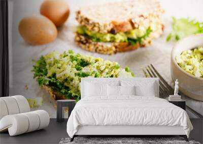 Healthy breakfast toast with avocado egg salad. Wall mural