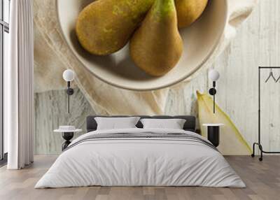 fresh green pears on a wooden table Wall mural