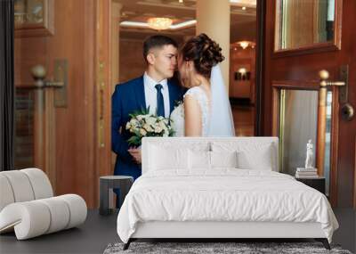 newlyweds in the apartment, a beautiful bride and groom in the rich interior 1 Wall mural