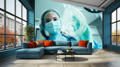 Experienced anesthesiologist doing her work stock photo Wall mural