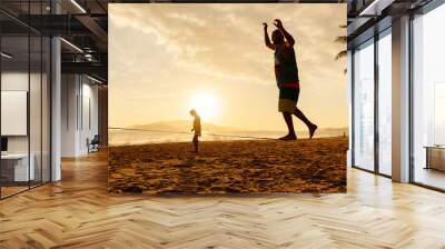 teenagers balance on slackline silhouette Wall mural