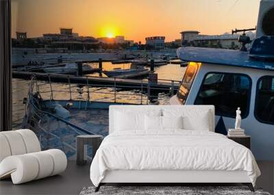 A boat jetty at sunset view Wall mural