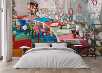 Chairs, table and toys. Interior of kindergarten Wall mural