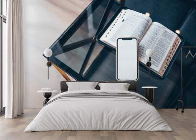 Phone screen blank and Bible on the table Wall mural